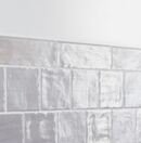 Online Designer Bathroom Montauk Fog 2x8 Gray Ceramic Bullnose with Mixed Finish