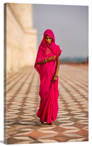 Online Designer Home/Small Office Indian woman in red dress walking by the Taj Mahal, Agra, India