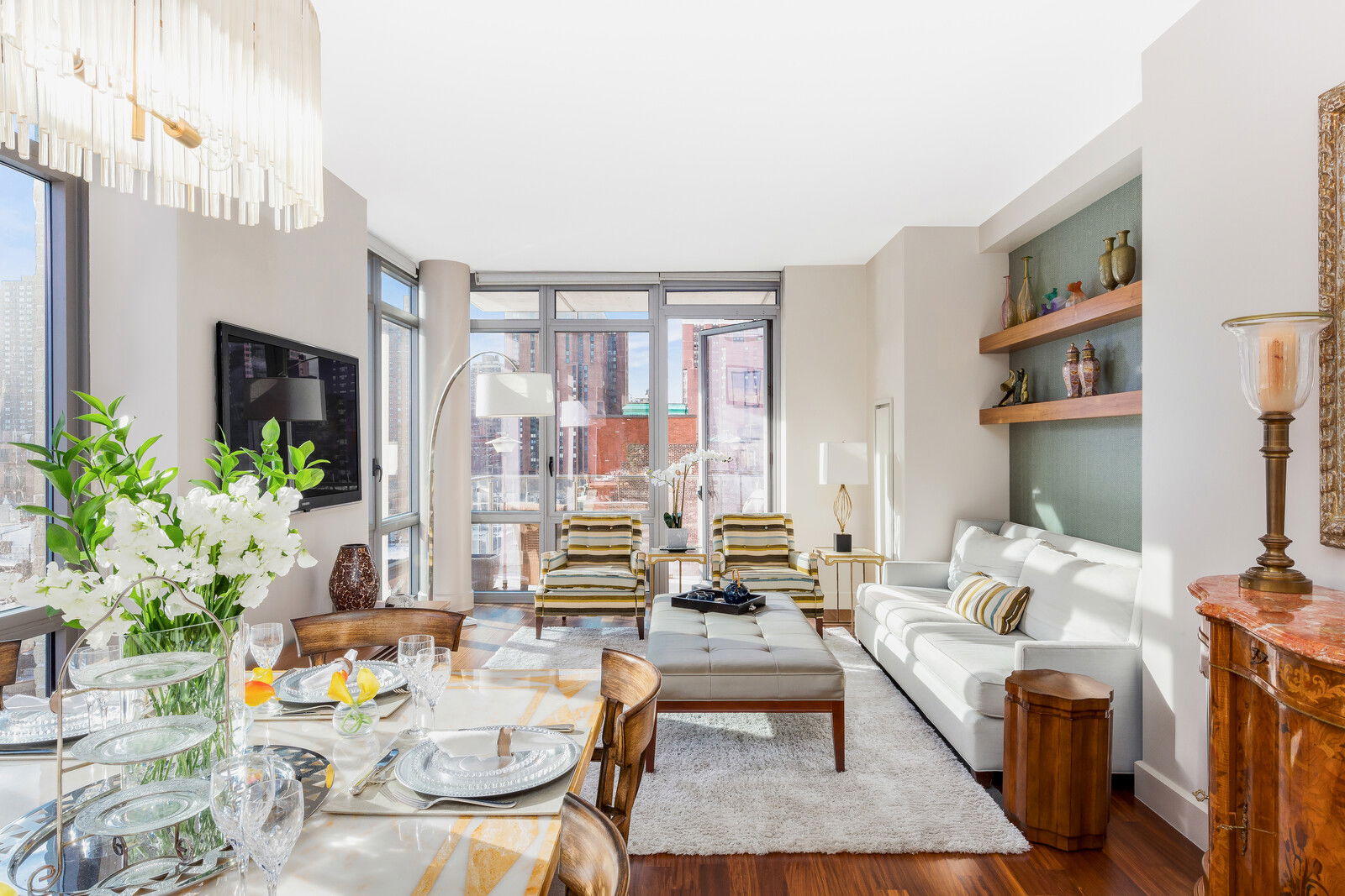 Modern Summer Combined Living Room and Dining Room with Fresh Flowers 