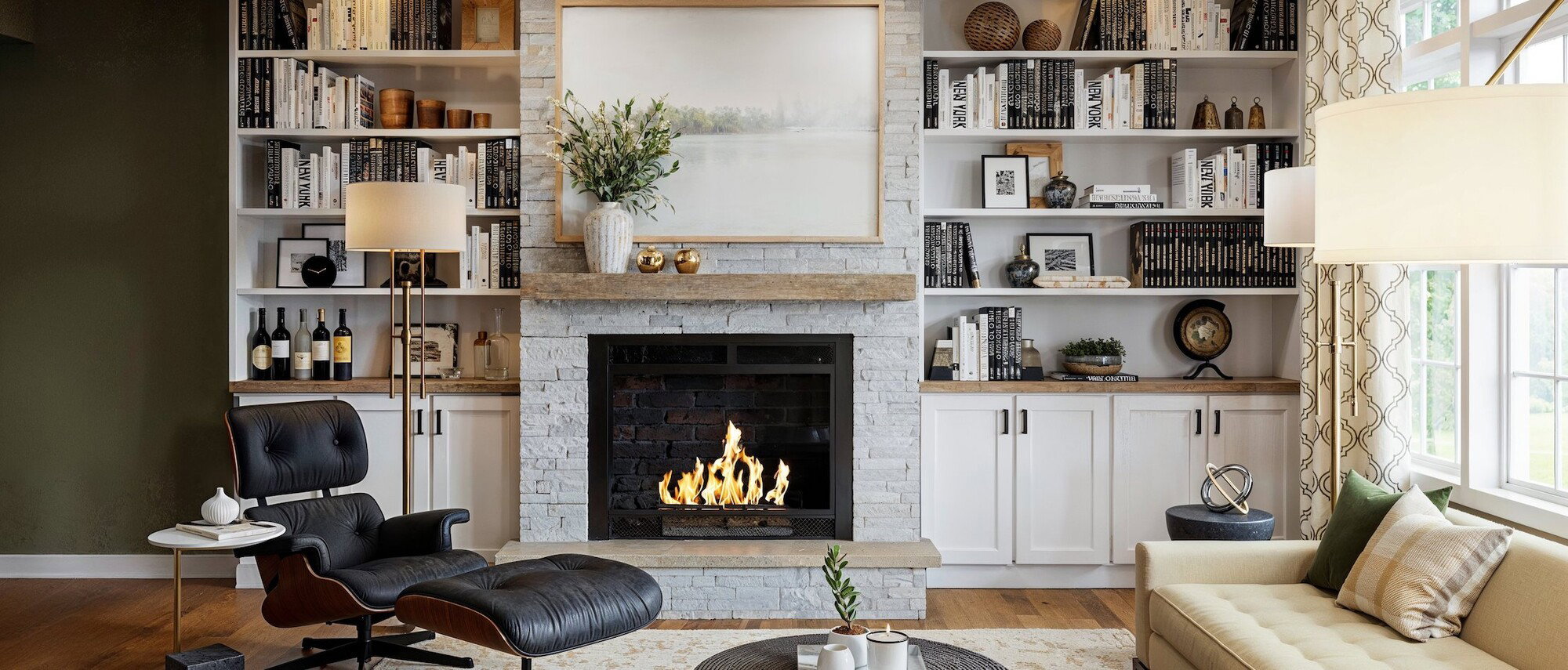 Green Walls Transitional Living Room Design by interior designers in Syracuse, New York