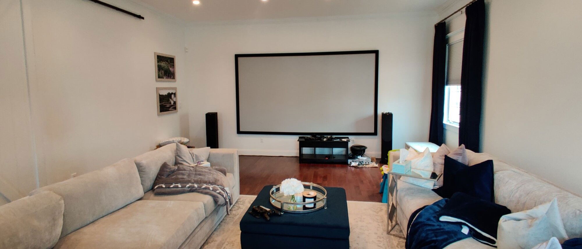 Spacious Living Room with Ceiling Beams Design- Before Photo