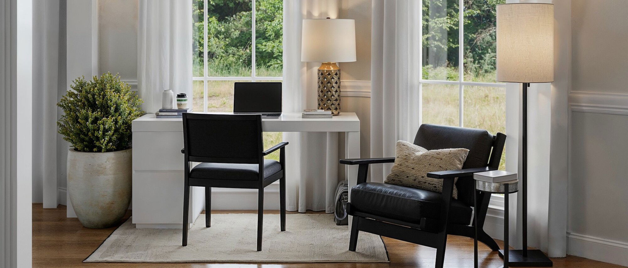 Contemporary High Ceilings Home with Fireplace by interior designers in Charlotte, North Carolina