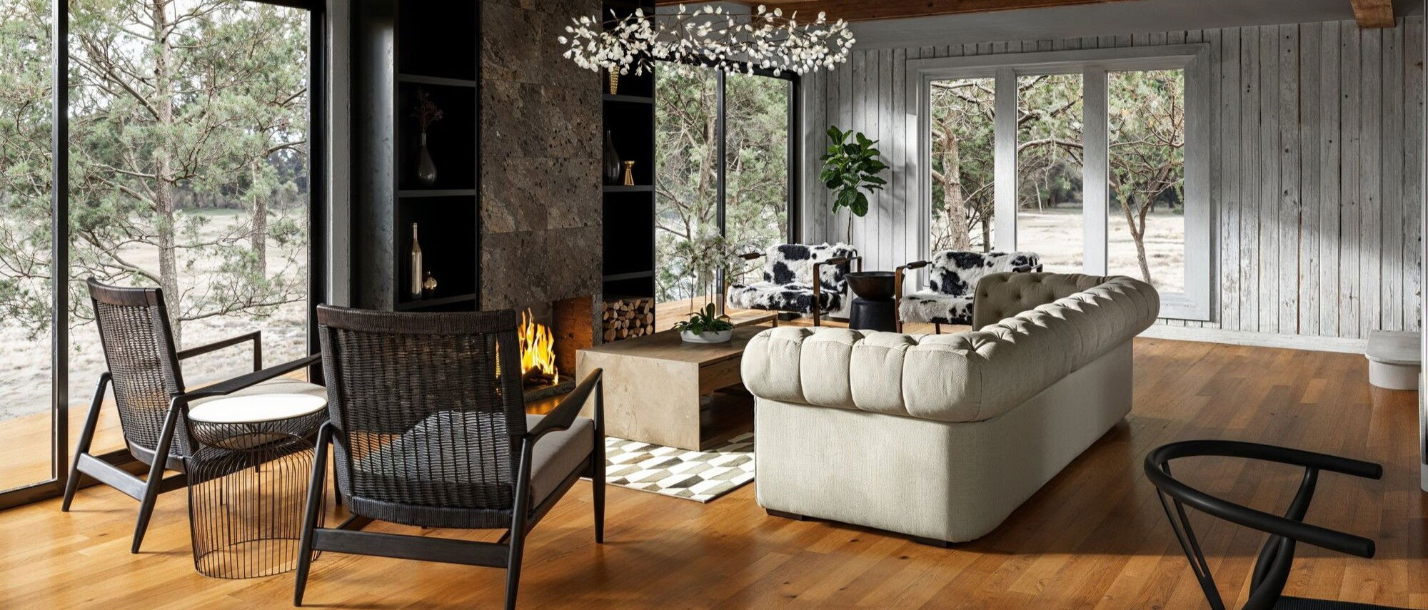 Modern Rustic Lakehouse Living and Dining by top Cedar Rapids interior designers