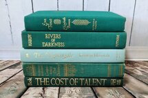 Online Designer Living Room Jade and Teal Book Stack