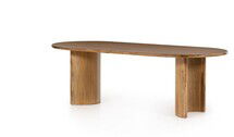 Online Designer Dining Room A study in shape. Sand-colored acacia forms crescent-shaped legs and a sprawling oval tabletop, bringing grand, organic-infused presence to the dining room.