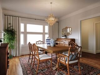 Serene Dining Room with vintage rug