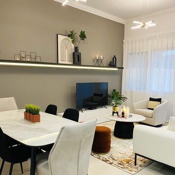 Online design Contemporary Combined Living/Dining by Hajara M. thumbnail