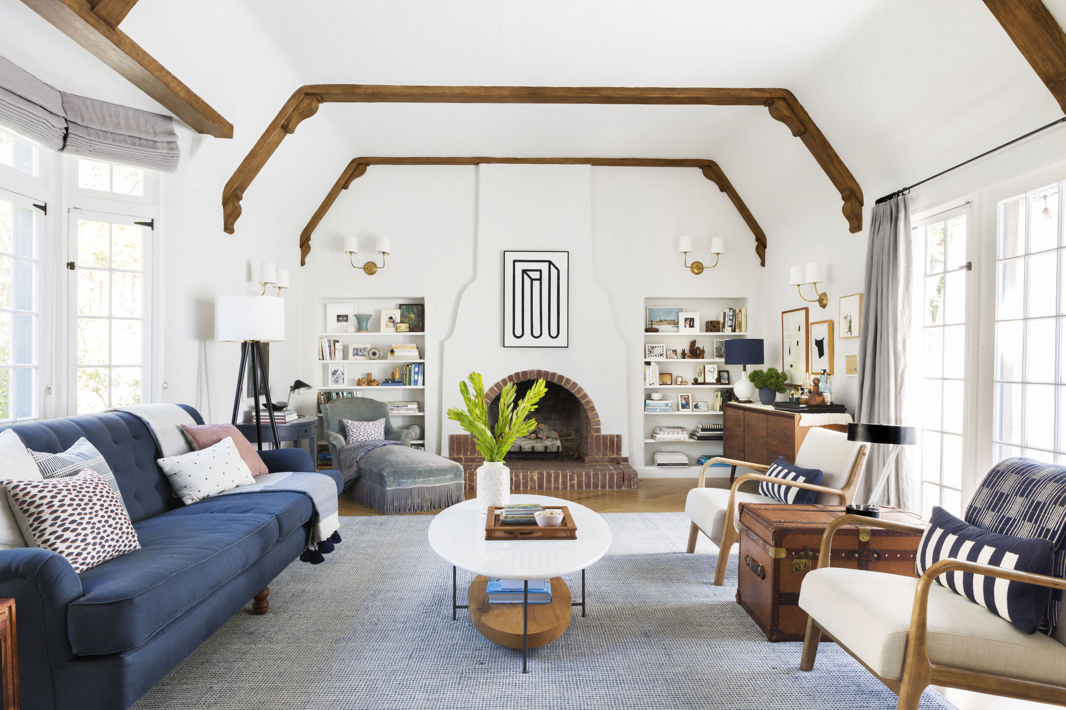 Vaulted Ceiling Tudor Living Room Design | Decorilla
