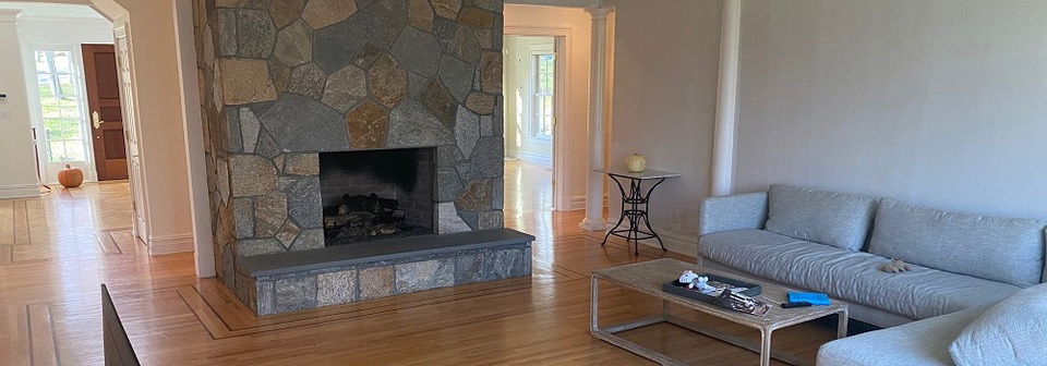 Contemporary Home Design with Stone Fireplace- Before Photo