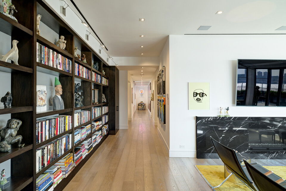 Modern Hallway Decorating Lined with Bookshelves