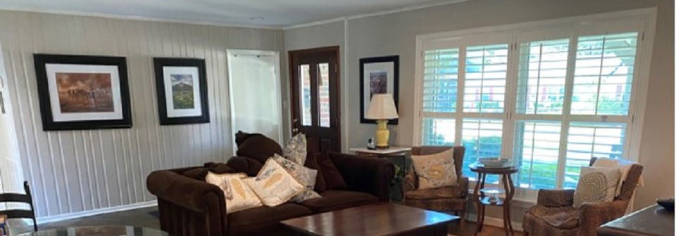 Colorful Den with Wood Paneling Walls Decor- Before Photo