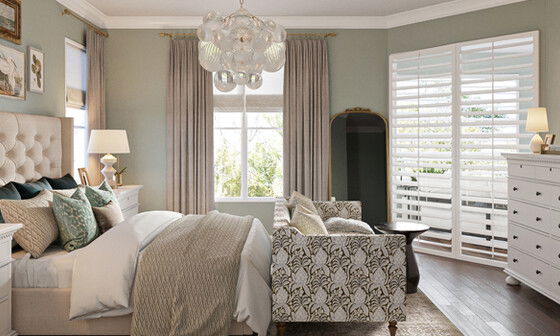 Glam Master Bedroom with Seating Area by affordable Gainesville interior designers