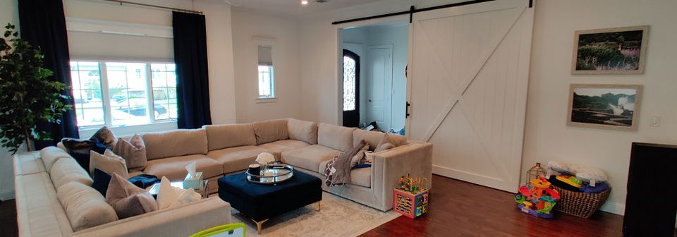 Spacious Living Room with Ceiling Beams Design- Before Photo