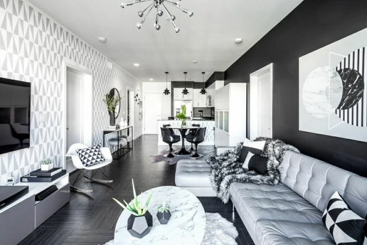 Color-coordinated black and white modern apartment design with modern apartment decor by Michelle B