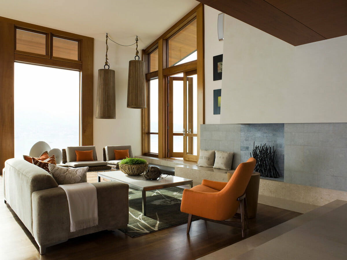 Modern living room with burnt orange and brown fall color scheme