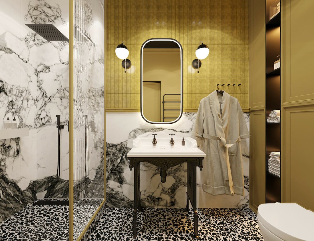 Yellow accent wall in an art deco bathroom
