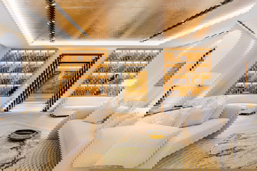 Modern transitional living room layout with statement built-ins by Decorilla designer, Molly I.