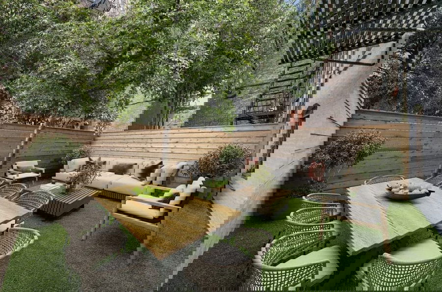 Urban patio designs-with textiles and wicker furniture by Decorilla designer, Leanna S.