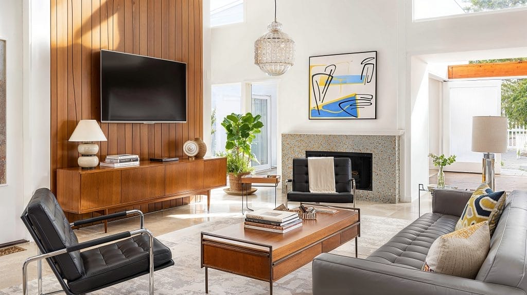 Living room interiors with a TV unit and wall panelling for home interiors by best interior designers