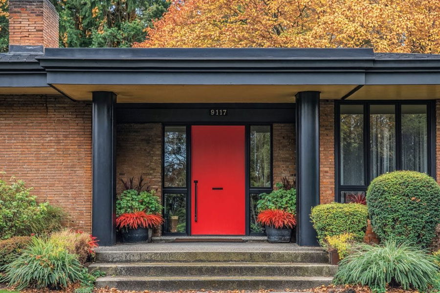 Use unexpected red door to increase curb appeal, design by Decorilla