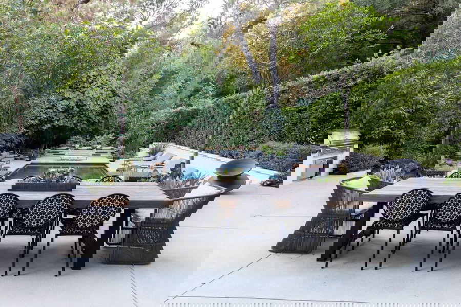 Best outdoor dining furniture in the pool patio by Decorilla designer, Galina H.