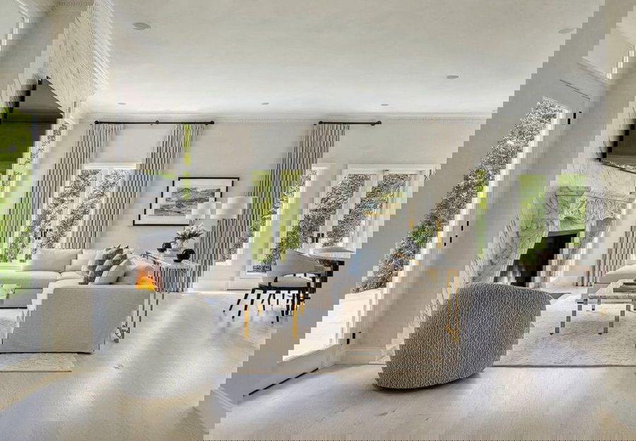 Transitional modern living room design by Decorilla