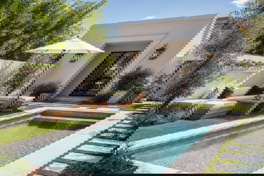 Modern poolside decorating by Decorilla