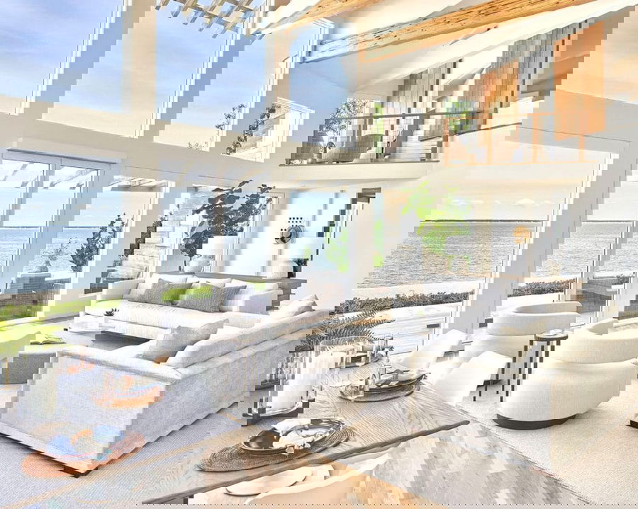 White seaside villa living room by Decorilla's top Malaga and Marbella interior designer, Elizabeth G.