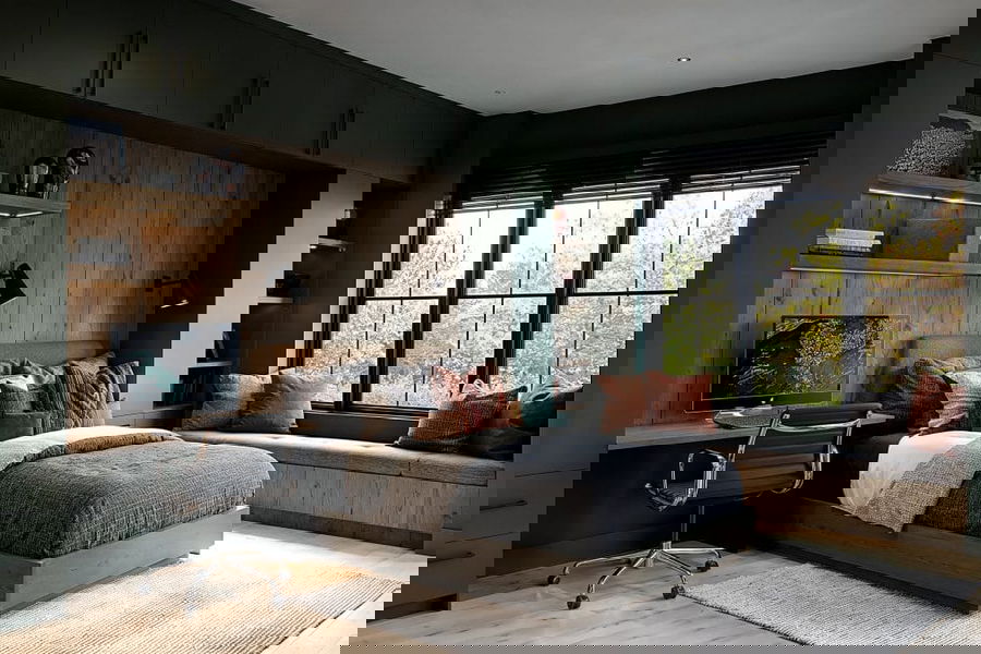 Cool kids room with tech spot by Decorilla