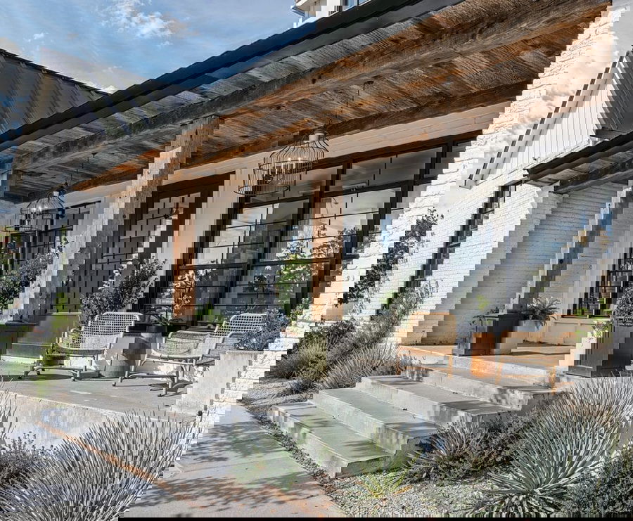 Welcoming entrance front porch by Decorilla