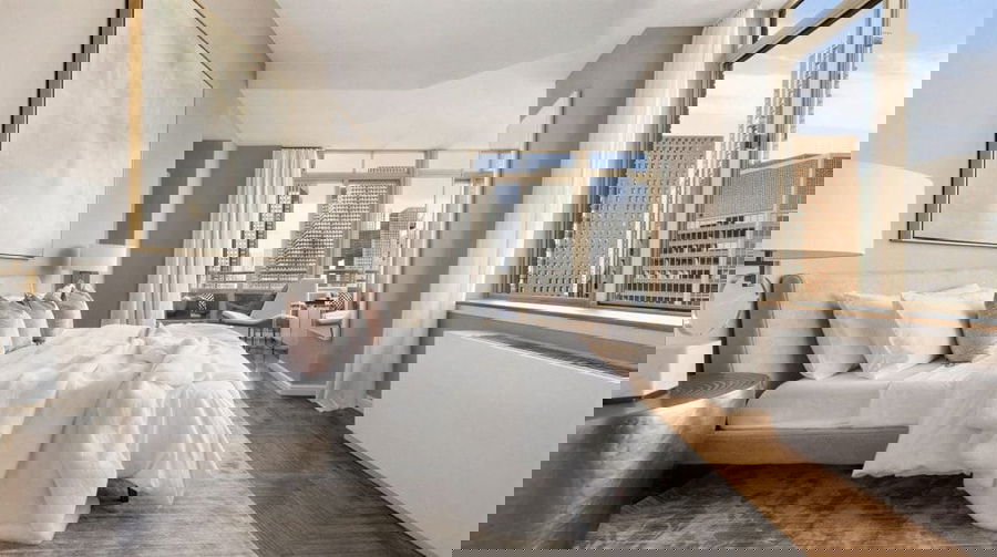 Glam transitional spare bedroom design by Decorilla designer, Leanna S.