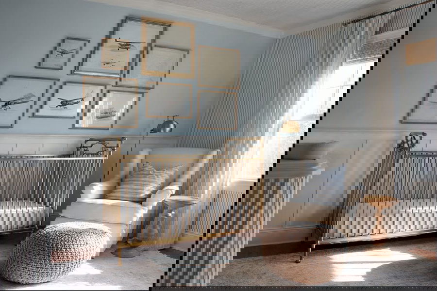 Cute aviation themed nursery by Decorilla