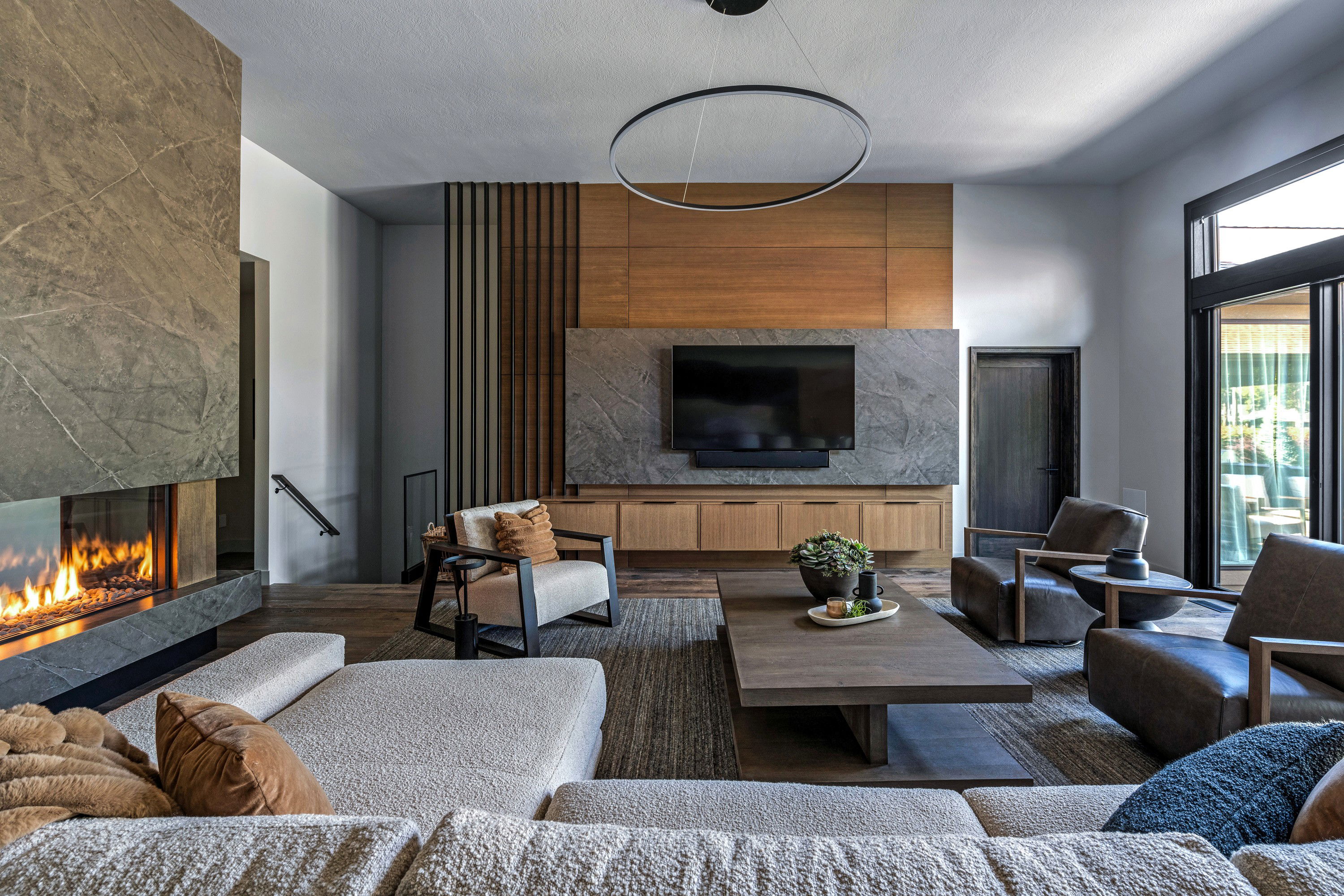 Before &amp; After: Masculine Living Room &amp; Kitchen Design by interior decorators in Naples, Florida