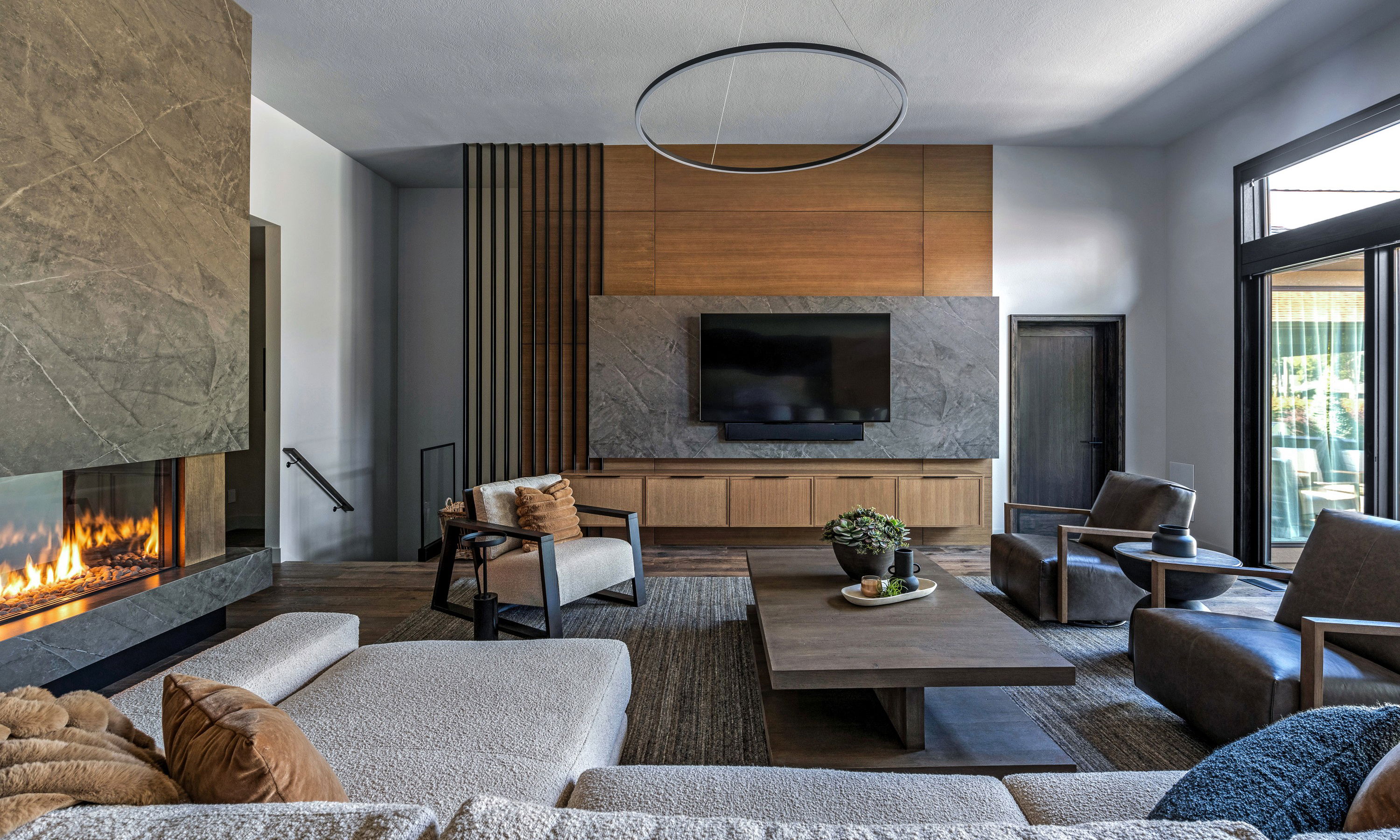 Before &amp; After: Masculine Living Room &amp; Kitchen Design by interior decorators in Naples, Florida