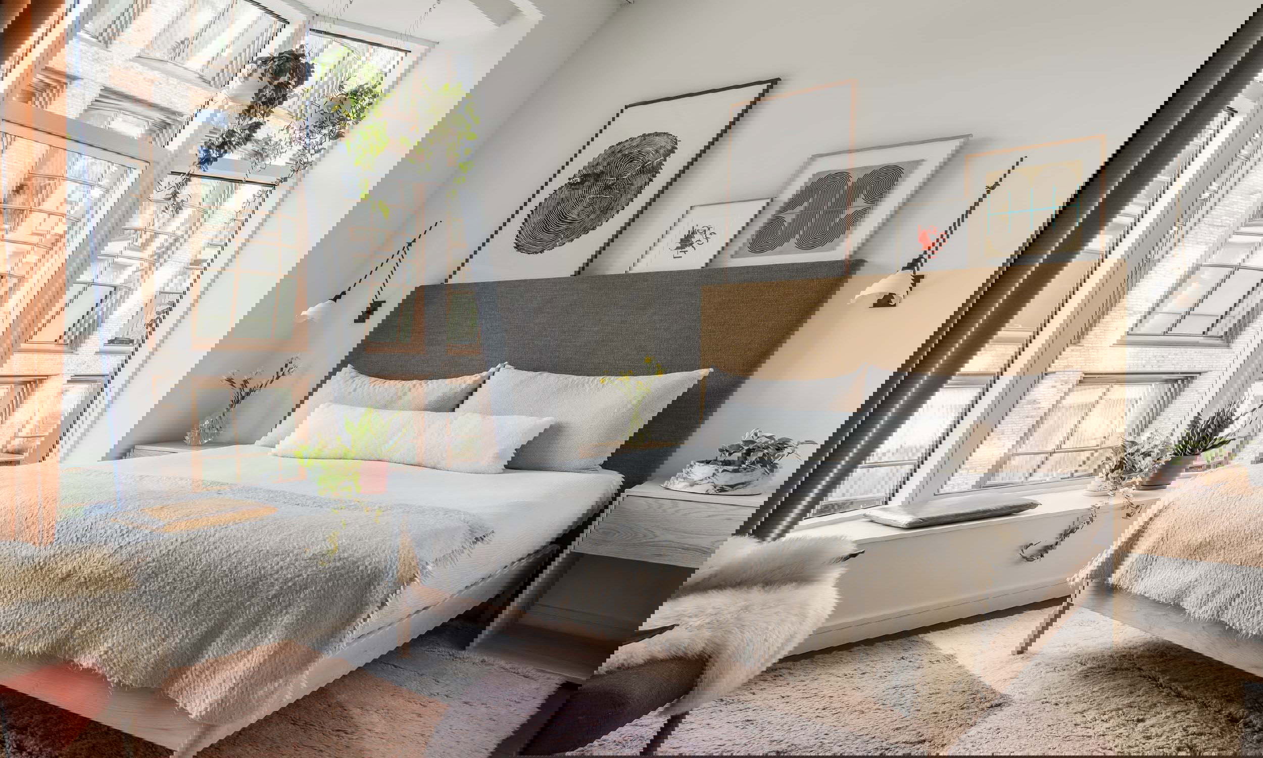 Before &amp; After: Serene Boho Modern Bedroom by interior decorators in Philadelphia, Pennsylvania