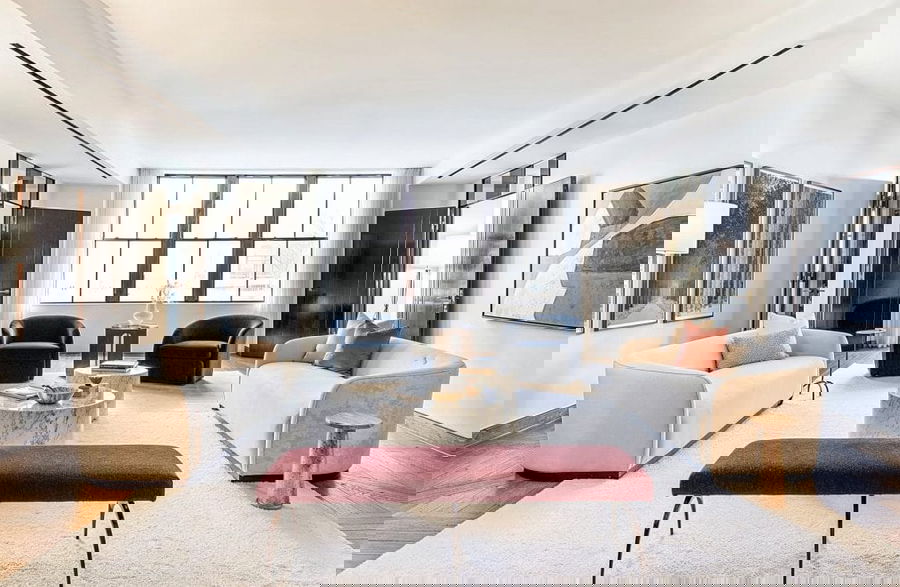 Transitional old money style living room by DECORILLA designer, Leanna S.