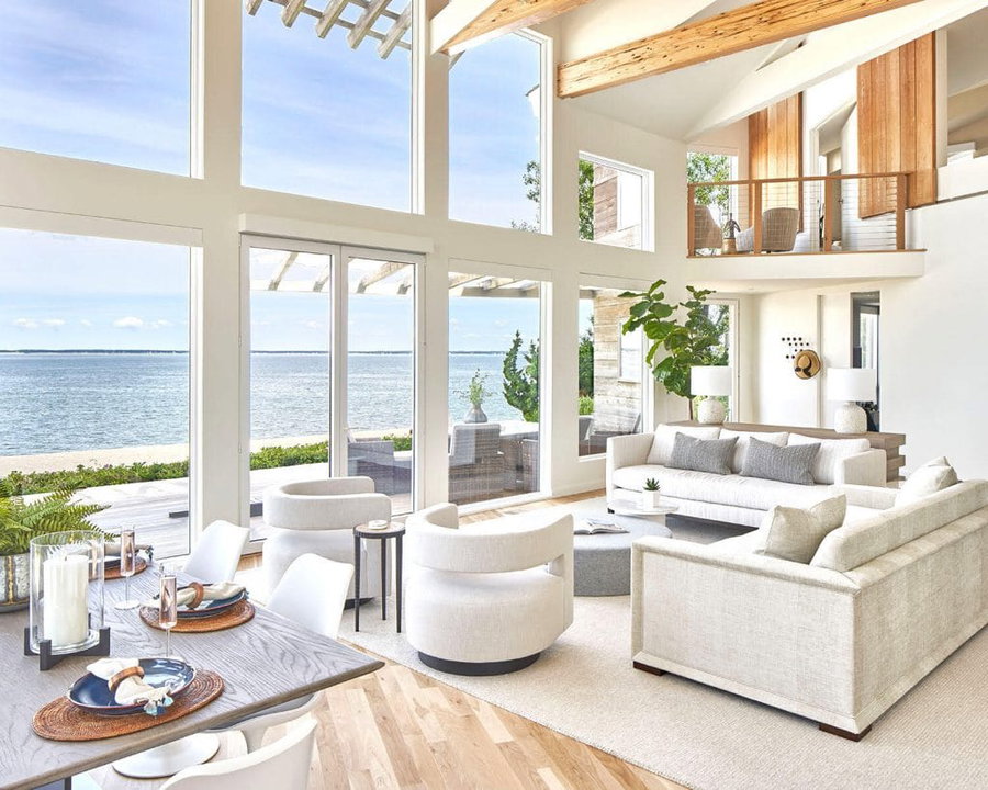 Open-plan coastal living room interior by Decorilla online interior design services in Australia