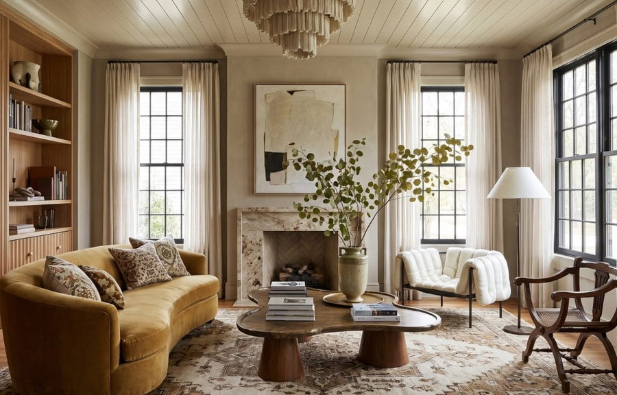 Limewash walls in a transitional living room by Decorilla